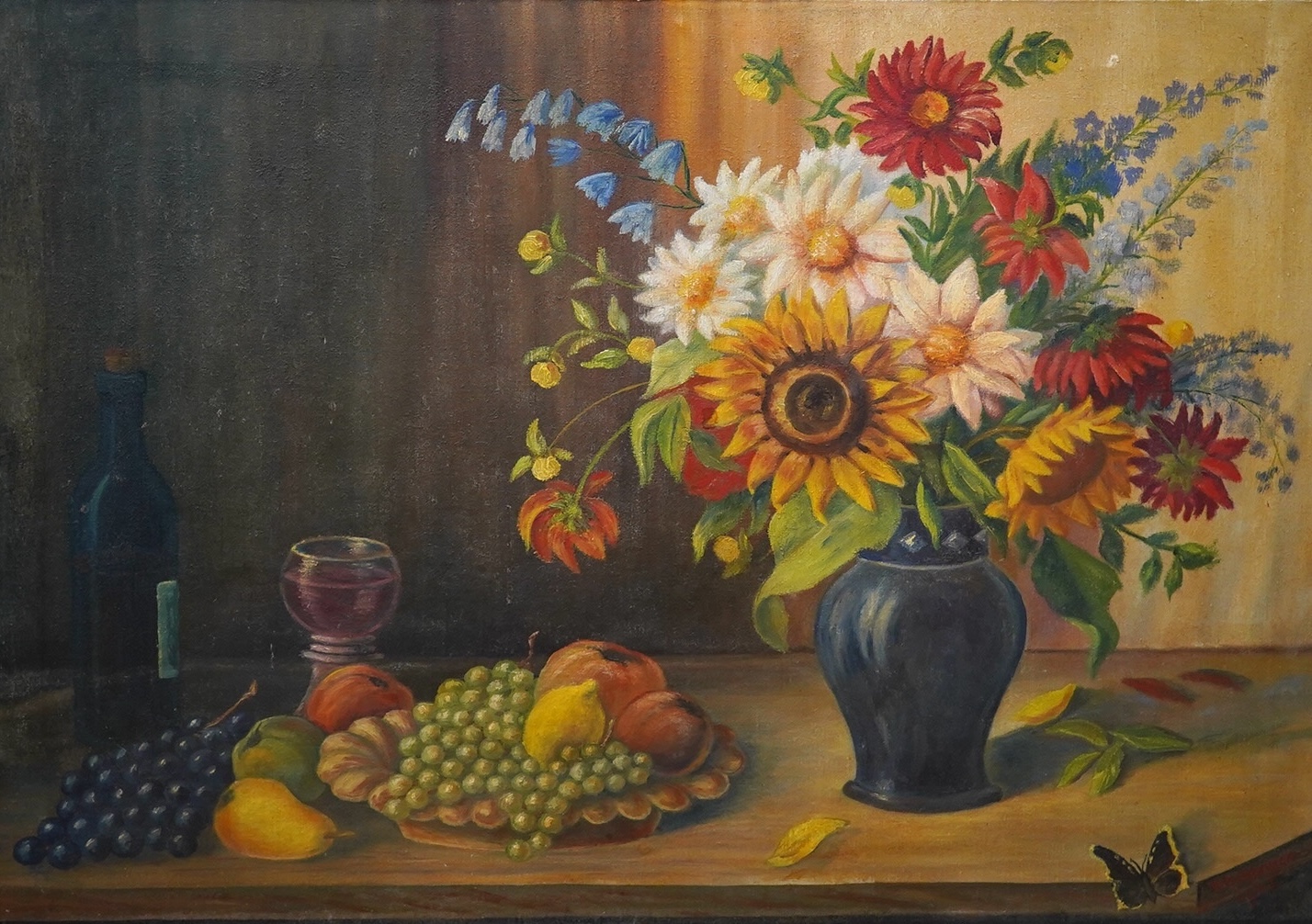 K. Hohberger, mid 20th century, oil on canvas, Still life of flowers and fruit, signed and dated 1947, 77 x 110cm, unframed. Condition - fair